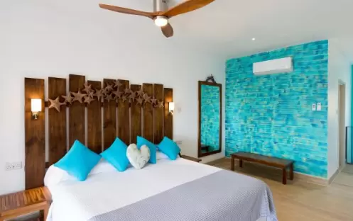 TRUE BLUE BAY GRENADA - COCOA POD SUITE BEDROOM SIDE VIEW